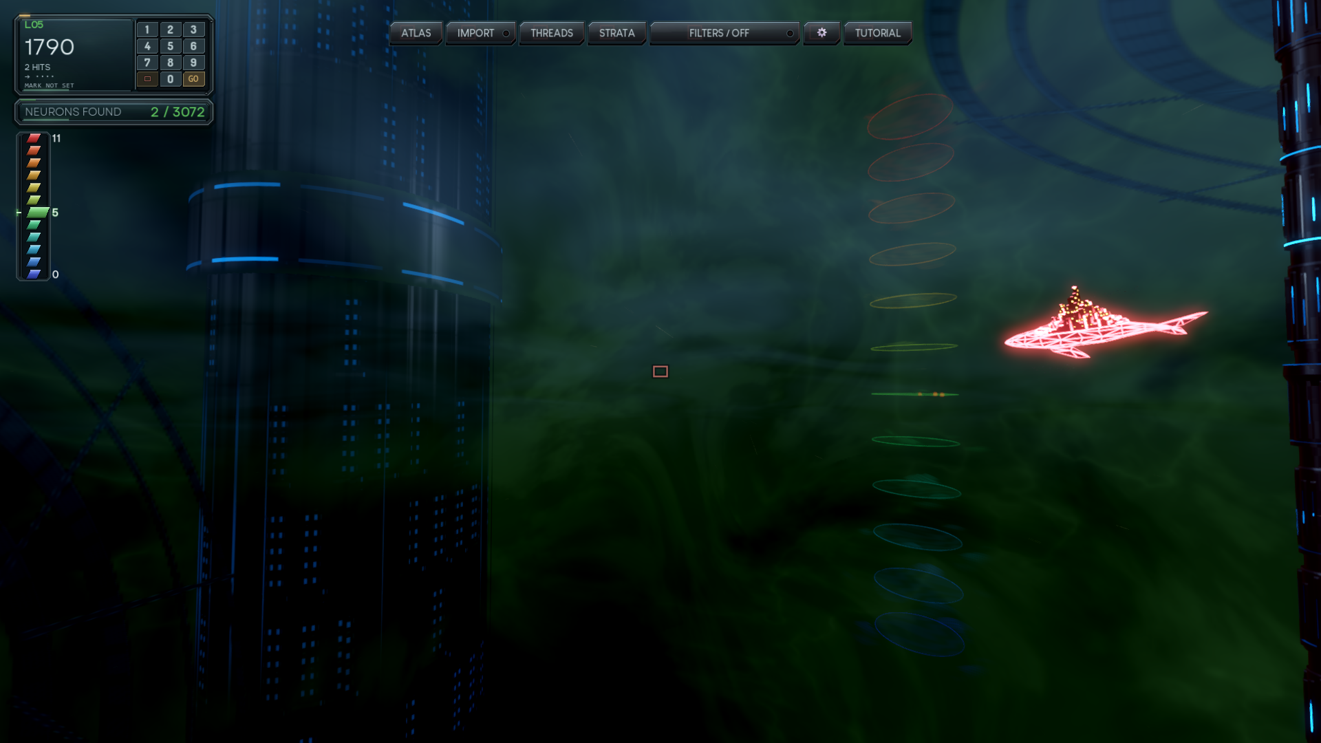 A pink wireframe whale hovering beside blue-lit towers and coloured rings in a green-blue world