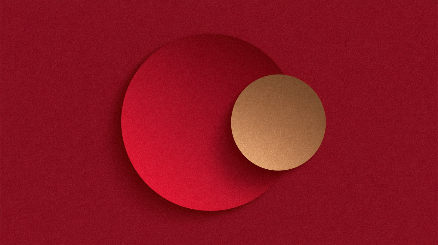 A small gold circle overlapping a larger red circle